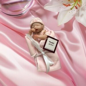 The Ashton Drake Galleries “Handful Of Love” collectible doll